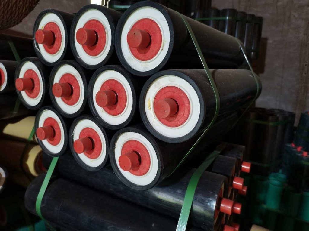 Black polymer idler rollers for belt conveyor support