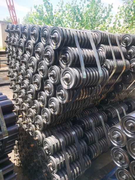 Bundled impact idlers for conveyor system