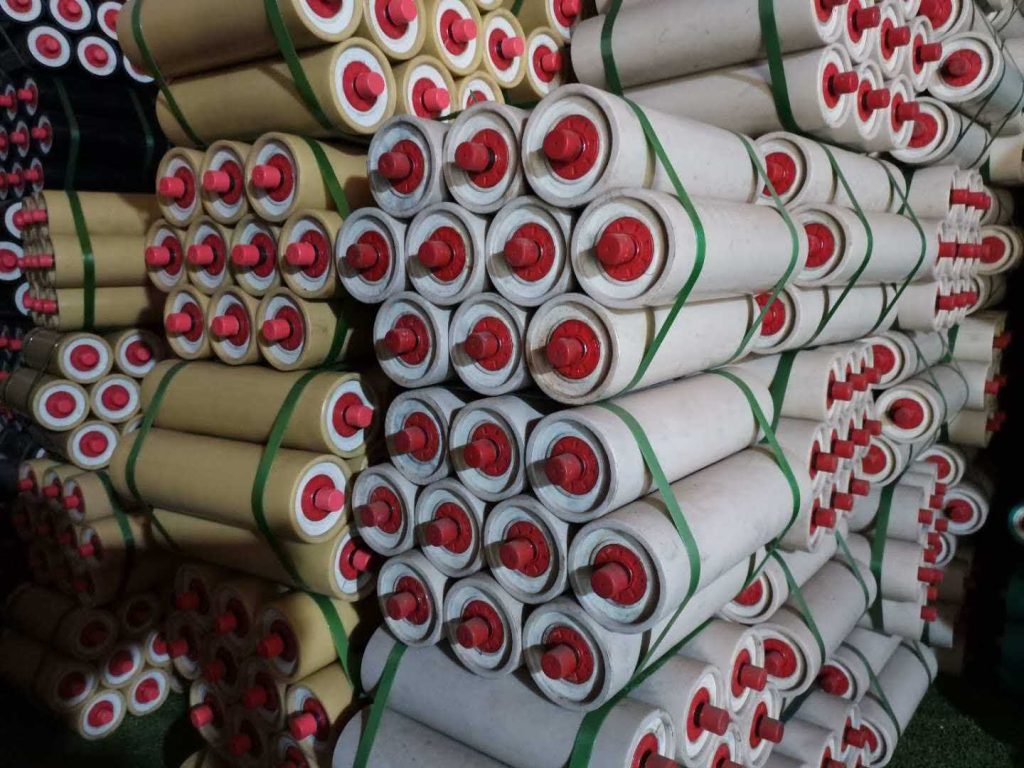White polymer conveyor rollers bundled for shipment