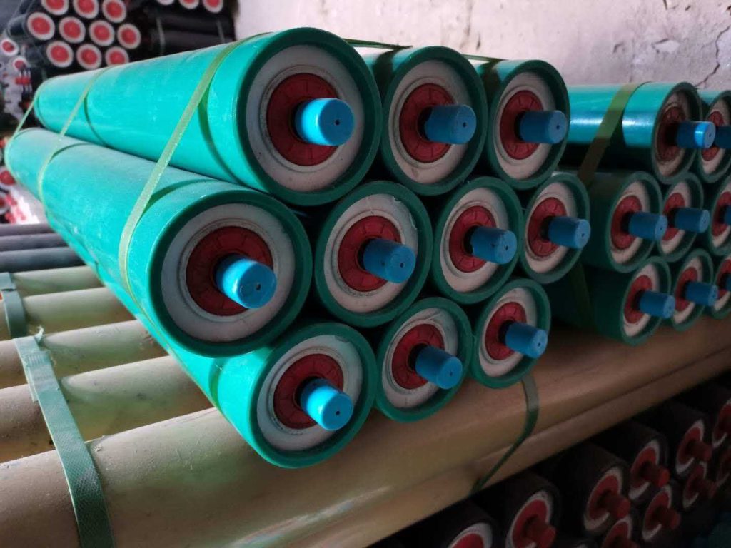 Green polymer rollers stacked in factory
