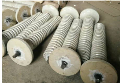 Ceramic idler rollers for belt conveyor system